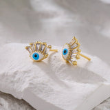 Boucles d'oreilles œil protecteur en cristal doré - Biloria