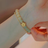 Bracelet en Jade et Fleur de Cerisier Ajustable - Biloria