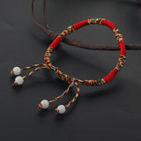 Bracelet Tibétain Tressé Rouge et Jaune – Porte-Bonheur Spirituel - Biloria