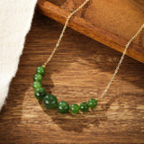 Collier en Jade Vert Arc de Joie en Laiton Doré - Biloria